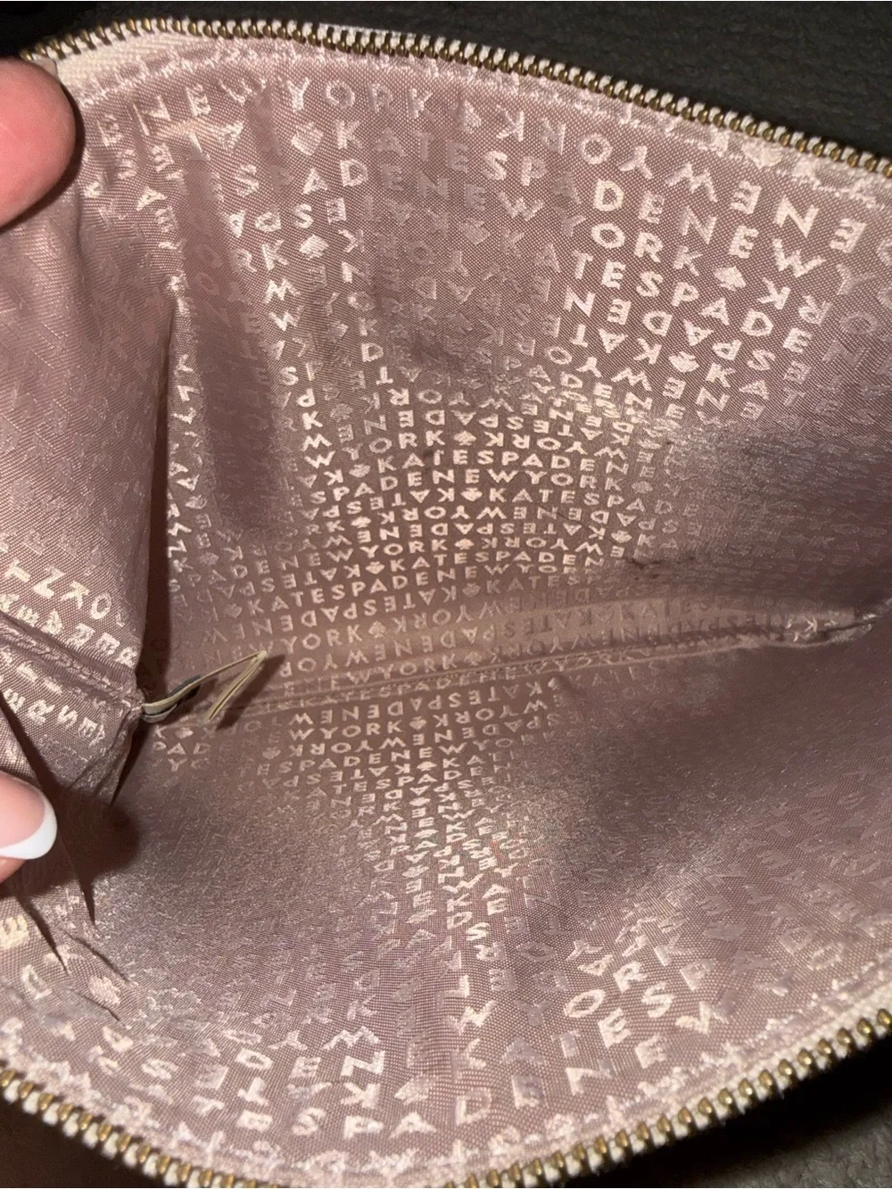 Kate Spade pebbled leather tassel clutch/pouch in light beige
